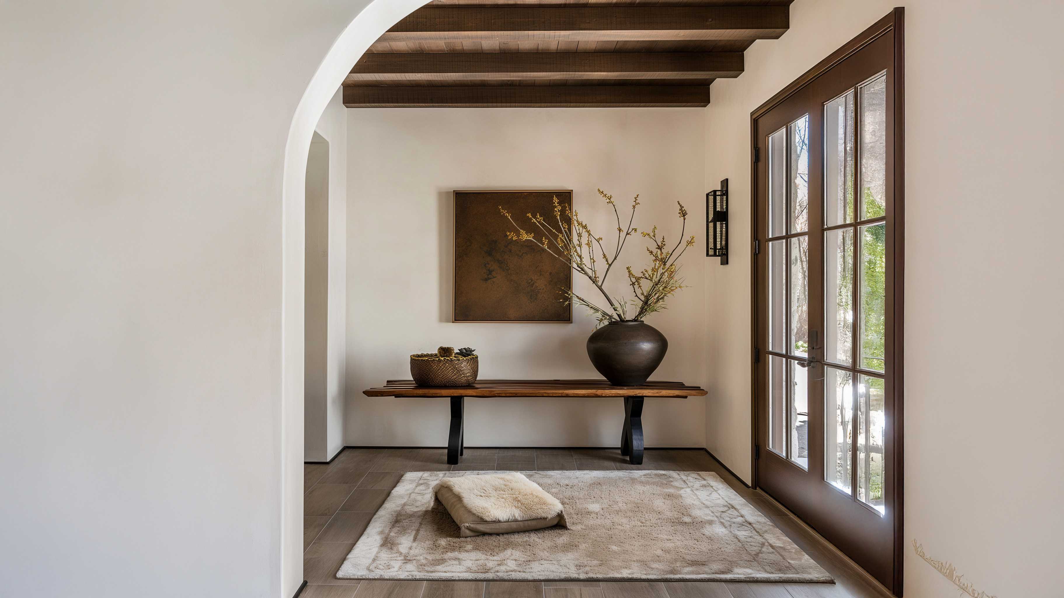 A warm, neutral interior inspired by traditional Portuguese craftsmanship and timeless European design.